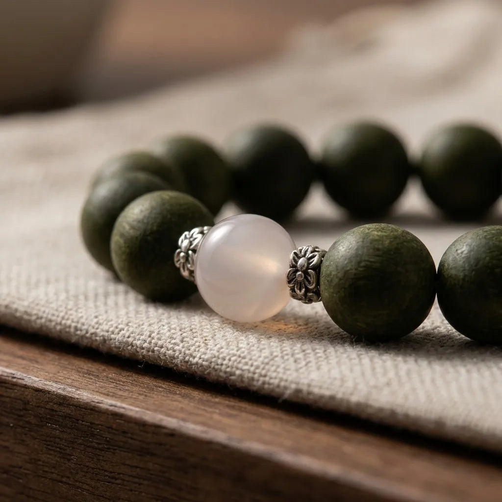 Day Reset bracelet - macro detail of white agate and silver carved spacers