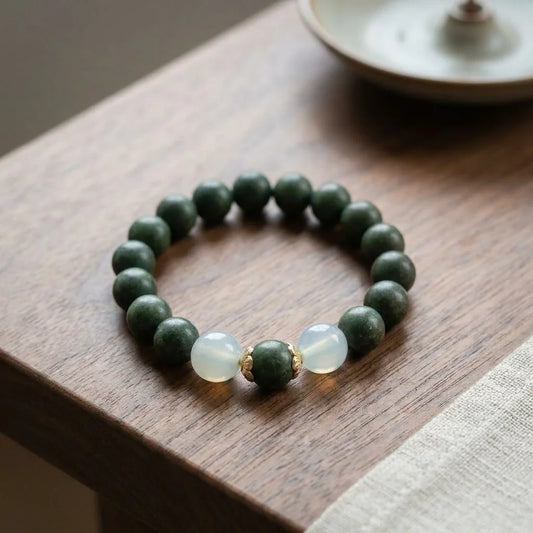 Nightfall He-Xiang bead bracelet on premium walnut tabletop