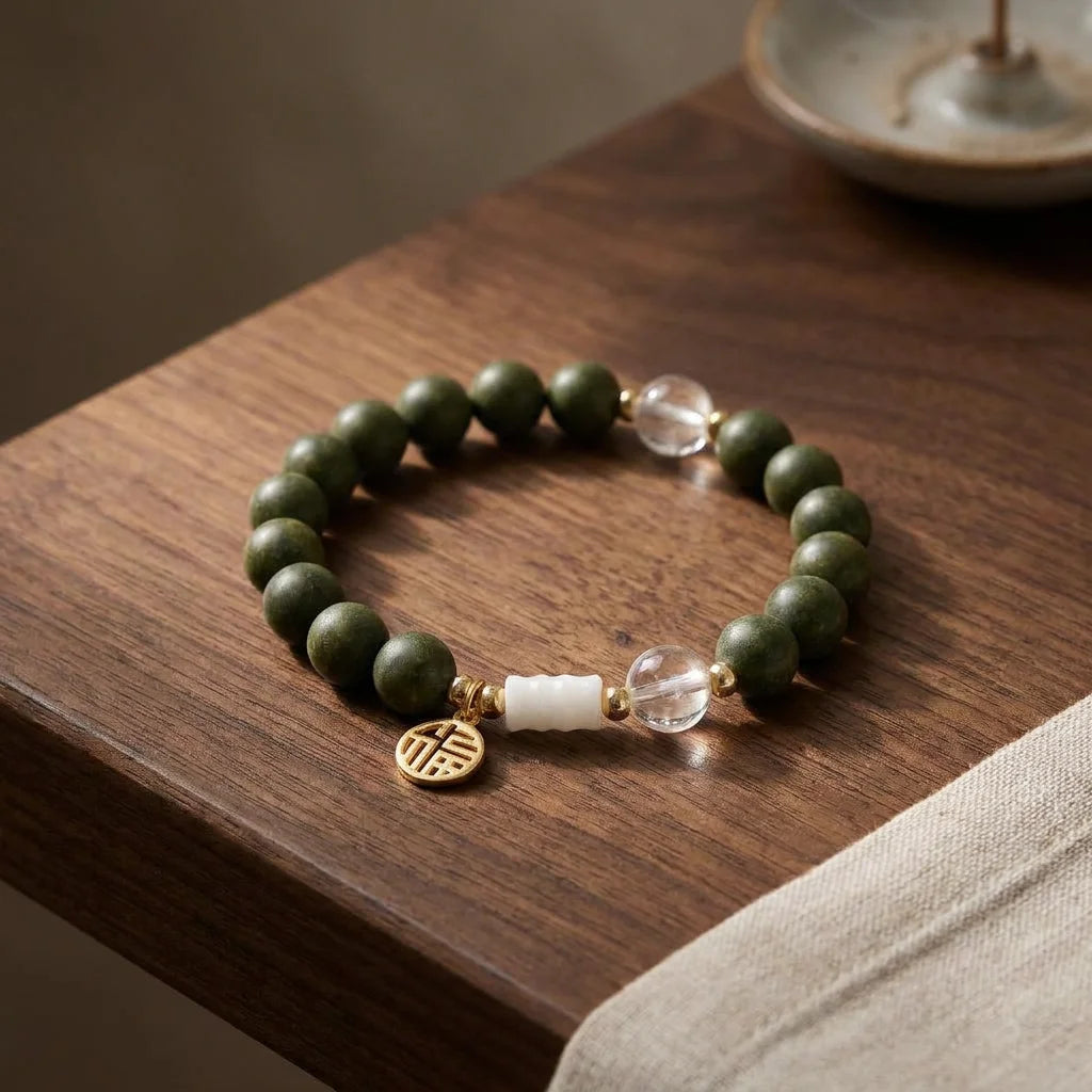 Day Reset He-Xiang bead bracelet on premium walnut tabletop