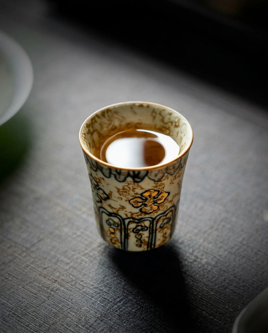 Gold-Rimmed Blue & White Master Cup: Top view of tea ritual